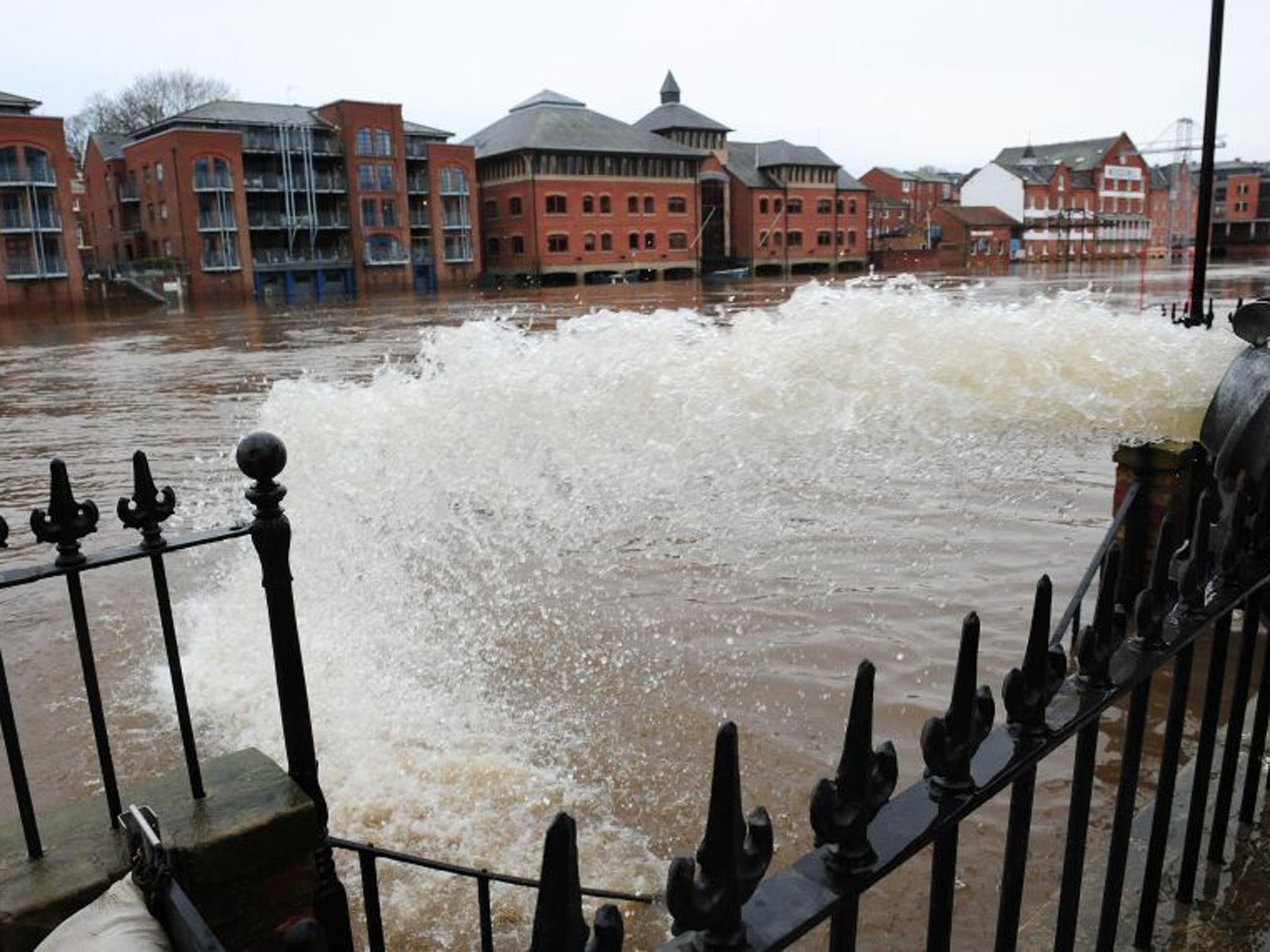 Pumps are used to help stop water from flooding homes in York city centre, after the River Ouse burst its banks following heavy rainfall over the Christmas period