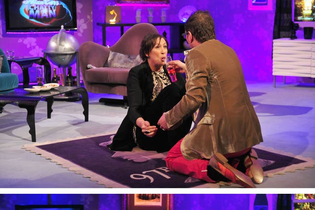 Miranda Hart performing "sip-ups" during a recording of one of the shows for Channel 4's Mash Up on Friday as she replaces Alan Carr (right) as host of Chatty Man.