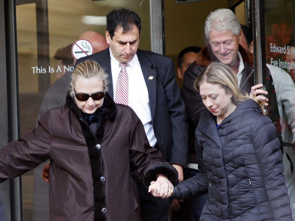 Hillary Clinton leaves New York Presbyterian Hospital with husband, Bill