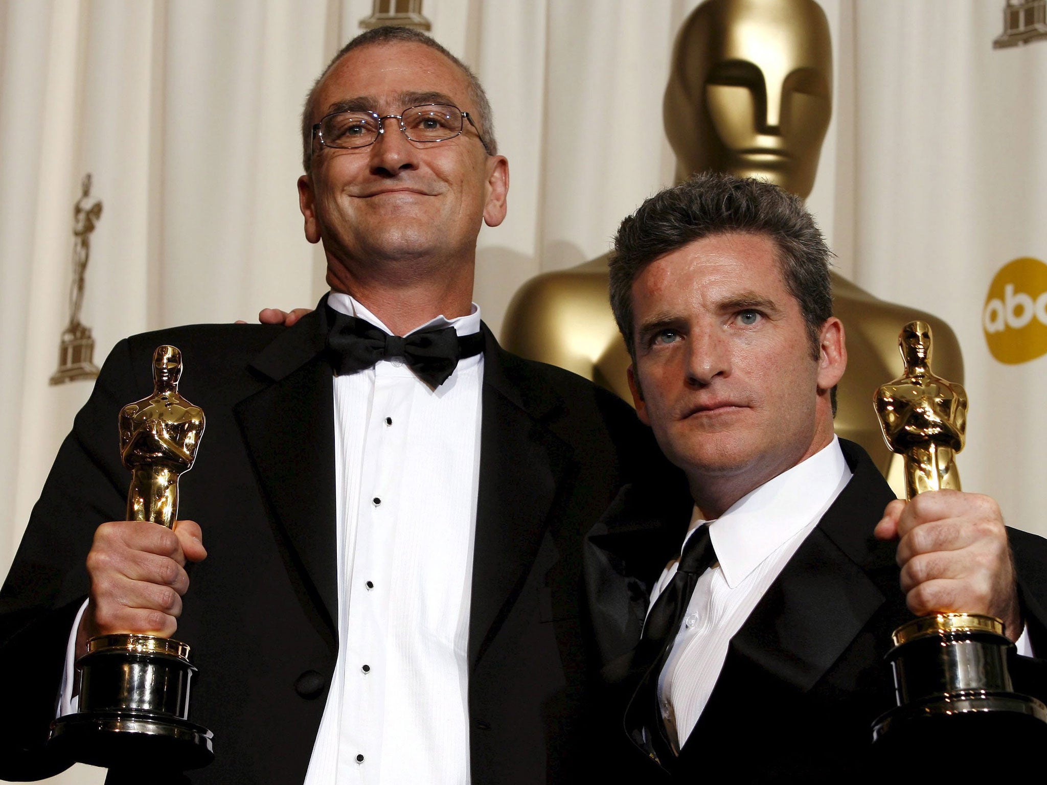 Hopkins, left, and Ethan Van Der Ryn pick up their 2006 Oscars