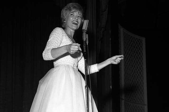 Page performs at The Dunes Hotel, Las Vegas, in 1962