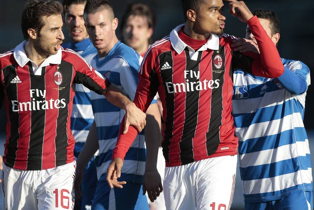 Milan’s Kevin-Prince Boateng gestures towards his abusers 