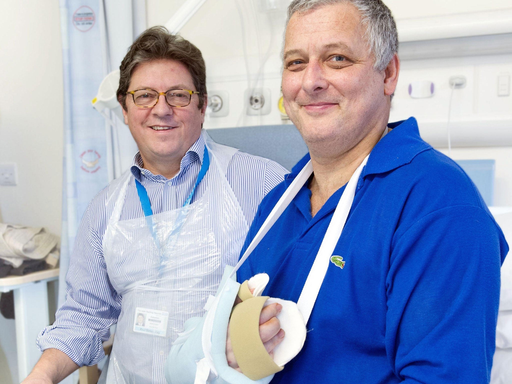 Dr Simon Kay, left, and his surgery patient Mark Cahill