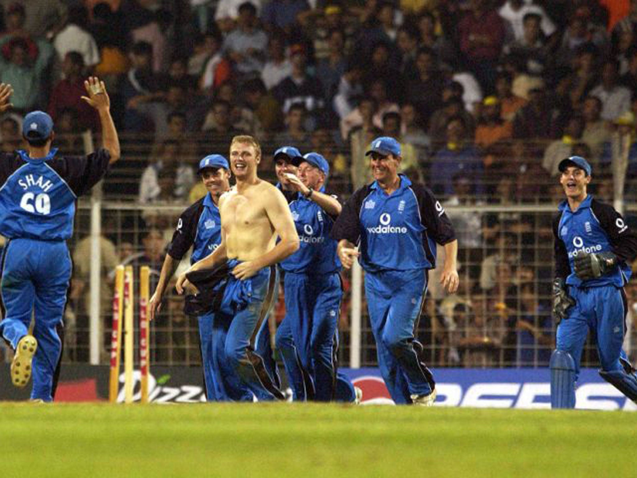 Andrew Flintoff celebrates with his shirt off in Mumbai in 2002