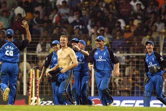Andrew Flintoff celebrates with his shirt off in Mumbai in 2002