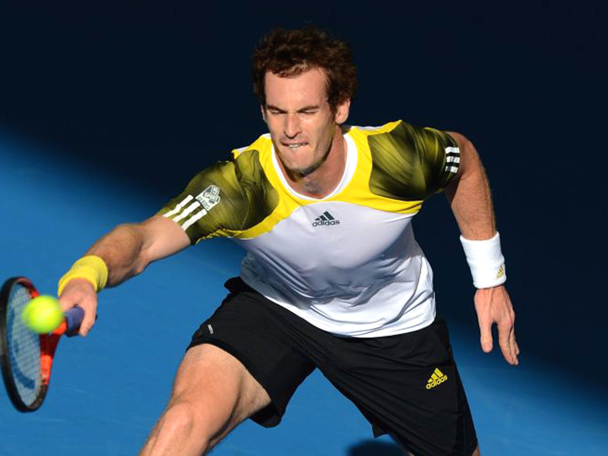 Andy Murray returns the ball during his defeat of Daniel Istomin in Brisbane yesterday