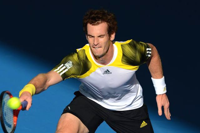 Andy Murray returns the ball during his defeat of Daniel Istomin in Brisbane yesterday