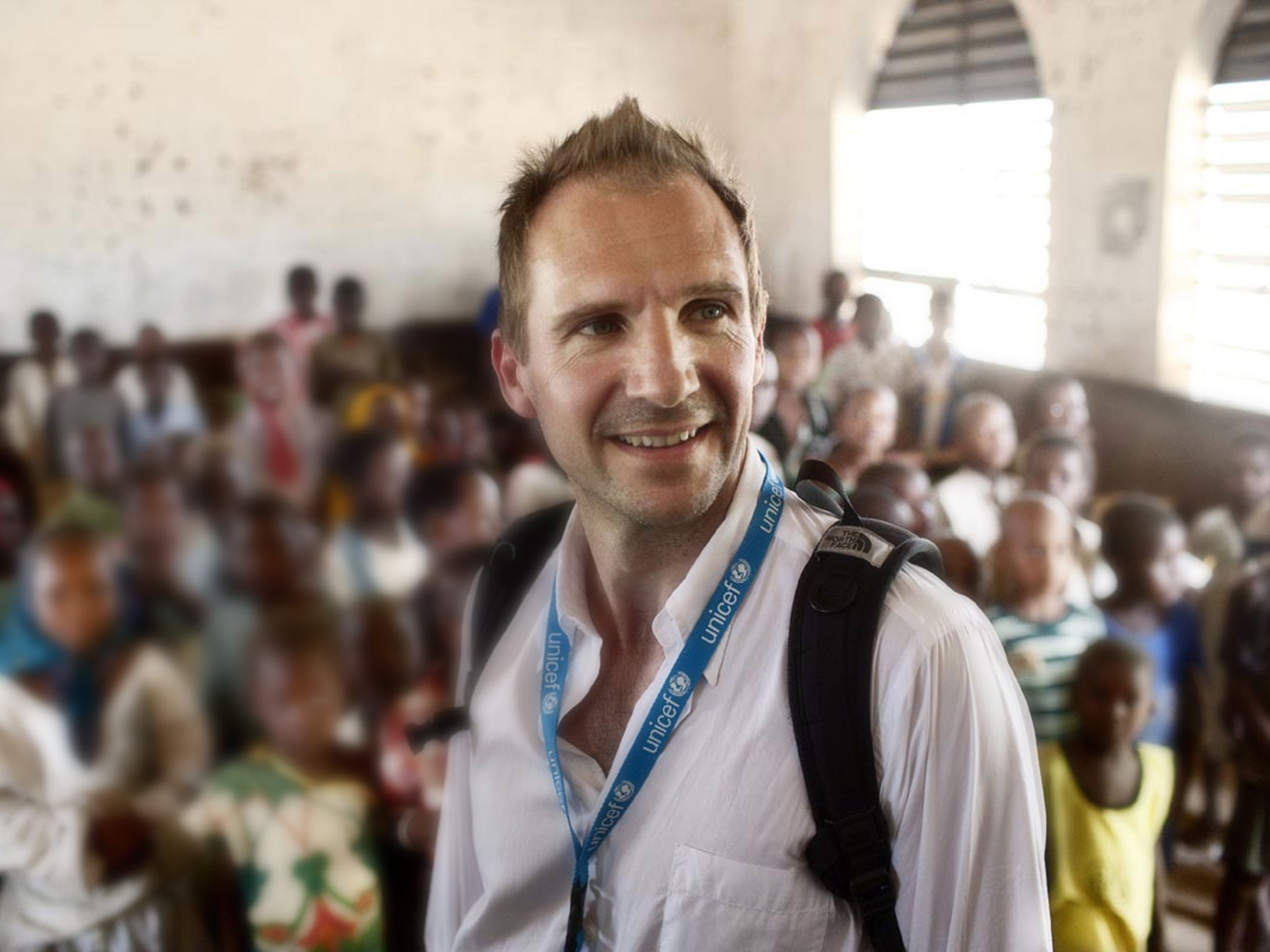 The actor Ralph Fiennes meets school children at a Unicef-supported school in Chad during a visit in 2009