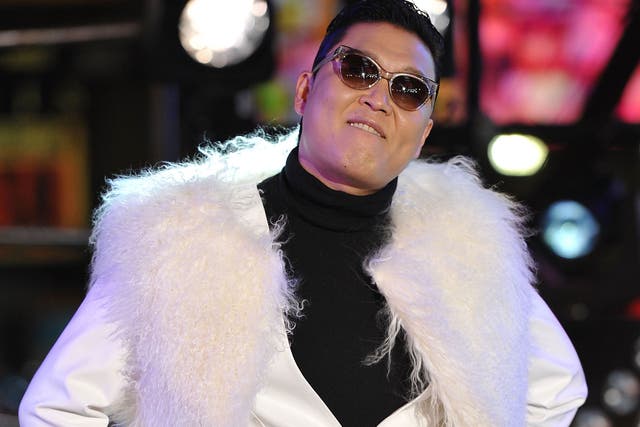 'PSY marks a new phenomenon - upbeat, relentlessly cheerful, cheesy and ironic'