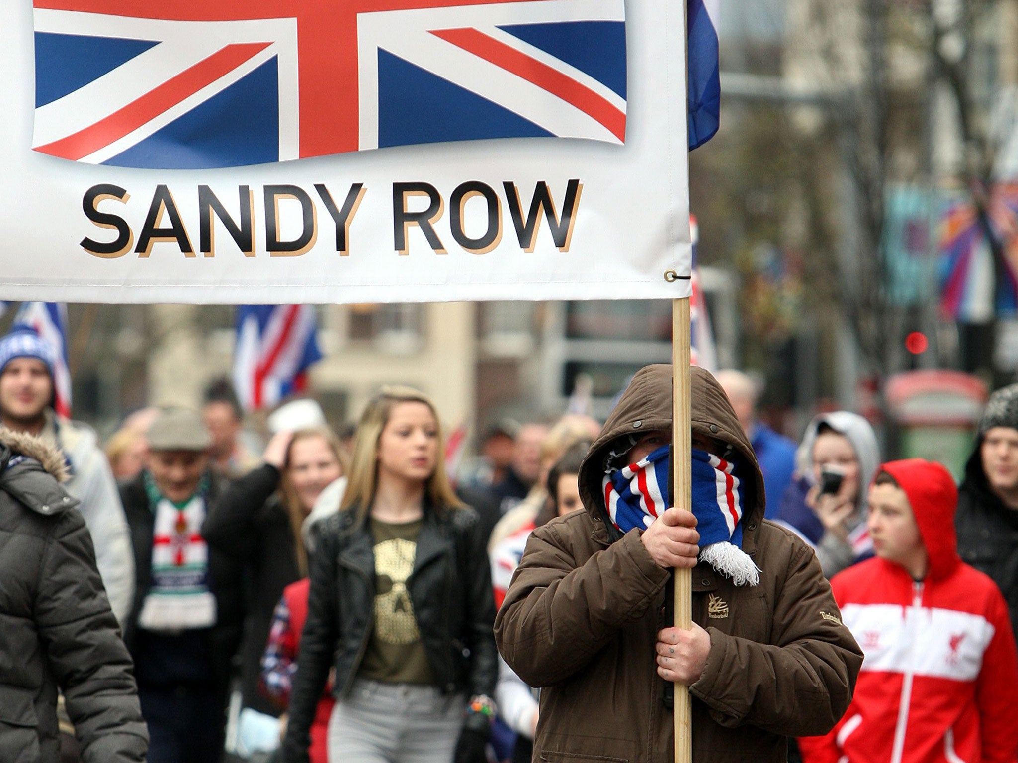 Loyalist protesters converge on Belfast City Hall yesterday