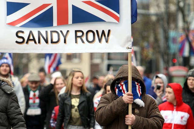 Loyalist protesters converge on Belfast City Hall yesterday