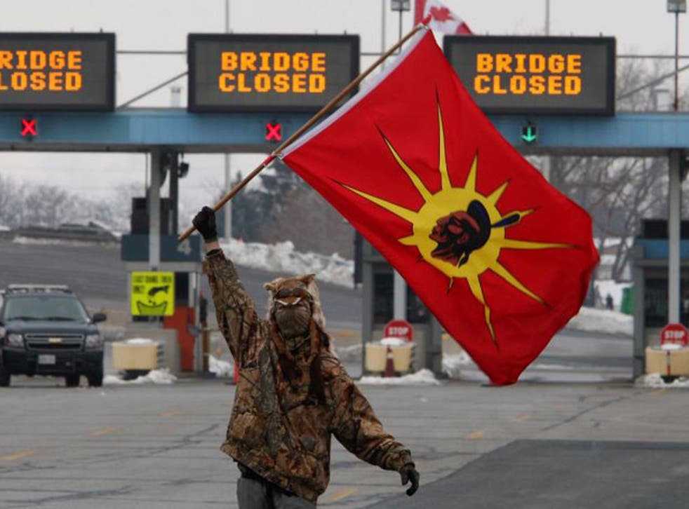 A First Nation activist at a blocked border crossing in Sarnia, Ontario
