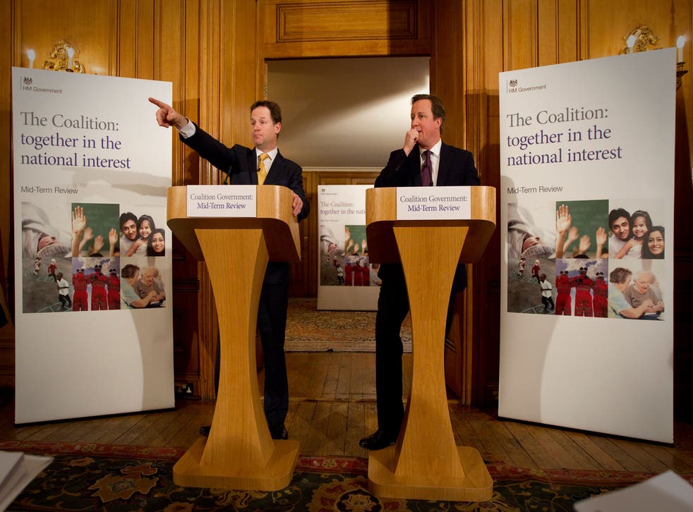 David Cameron and Deputy Prime Minister Nick Clegg attend a press conference at 10 Downing Street to mark the half-way point in the term of the coalition government