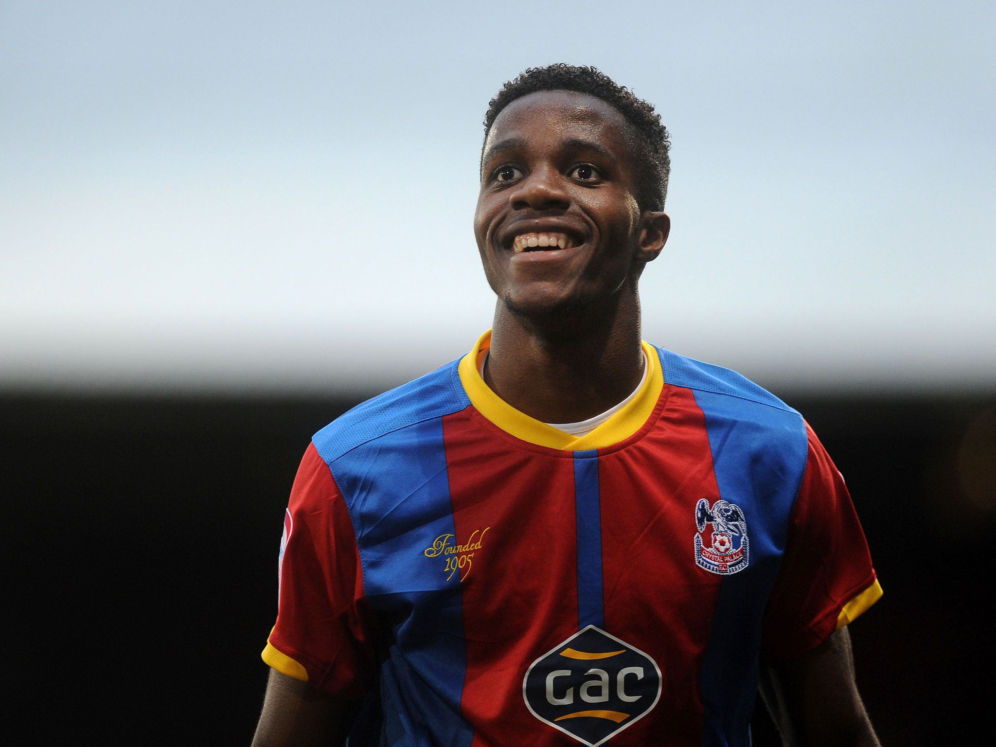 Crystal Palace are deeply divided over whether to sell Wilfried Zaha this month