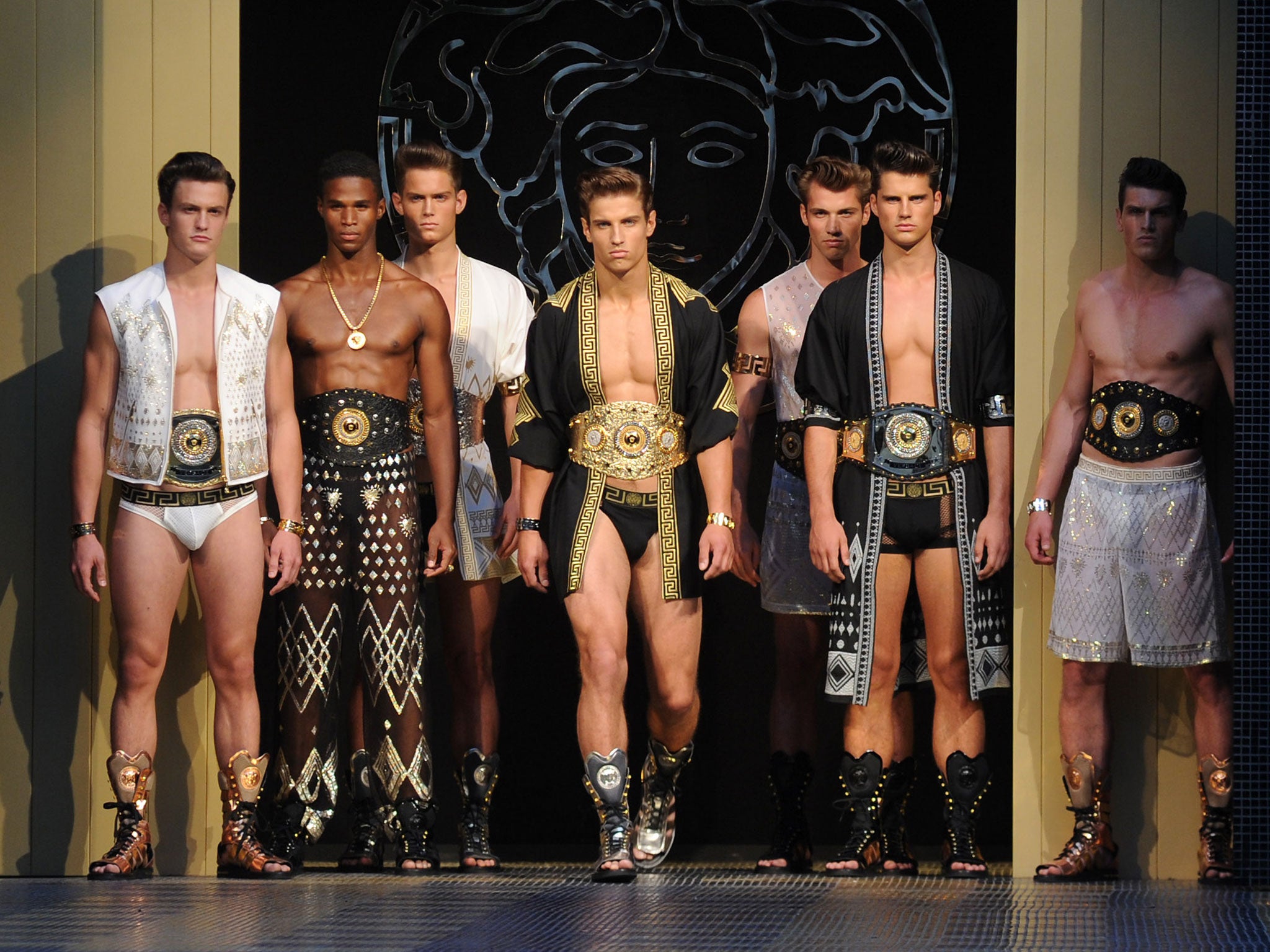 Models walk the runway during the Versace show as part of Milan Fashion Week Menswear Spring/Summer 2013 on June 23, 2012 in Milan, Italy.