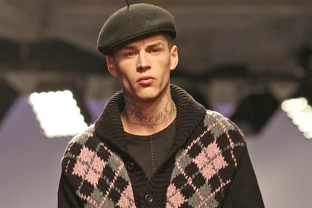 A model on the catwalk during the YMC show at the London Collections