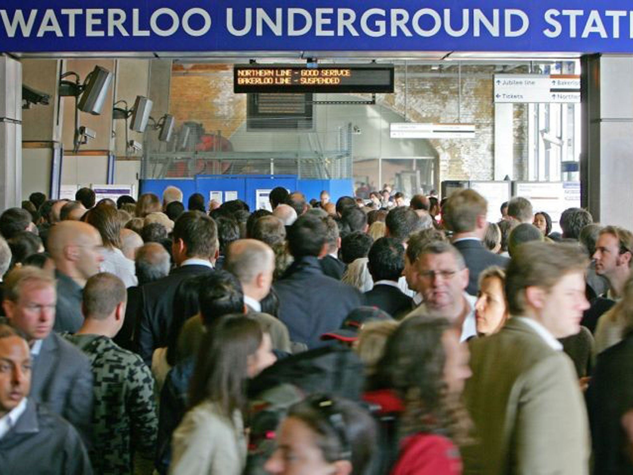 In this file picture taken on September 4, 2007 passengers jostle to enter the Underground station at Waterloo Station in central London, as commuters battled with severe transport disruption to get to work as unions staged a second day of strikes on the