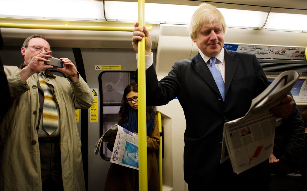 London Mayor Boris Johnson travelling on the Tube