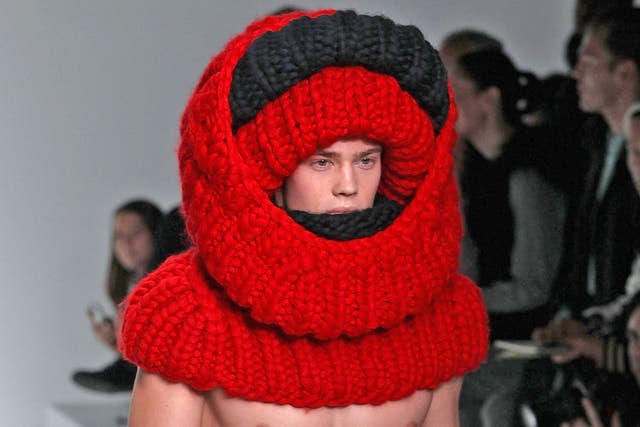 Fluffy and fun: A model on the catwalk during the Sibling show at the London Collections: MEN AW13