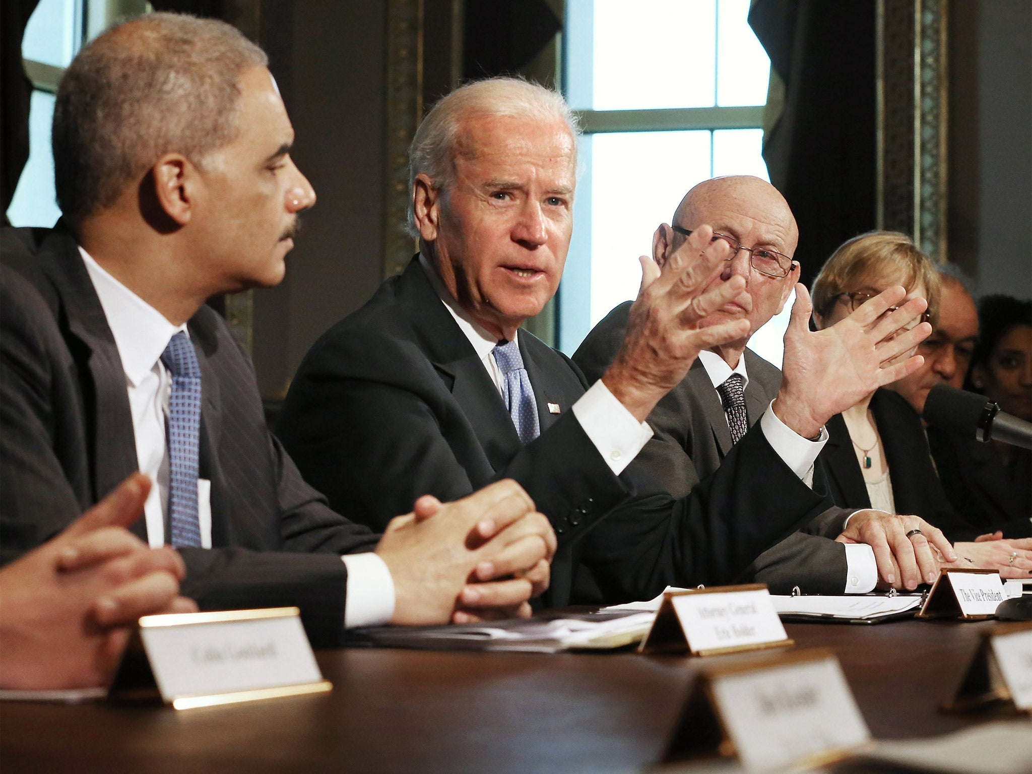 U.S. Vice President Joe Biden at a meeting with U.S. Attorney General Eric Holder (left) and gun safety advocacy groups