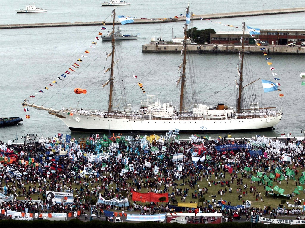 Hundreds of people attend the arrival of Argentina's frigate Libertad in Mar del Plata