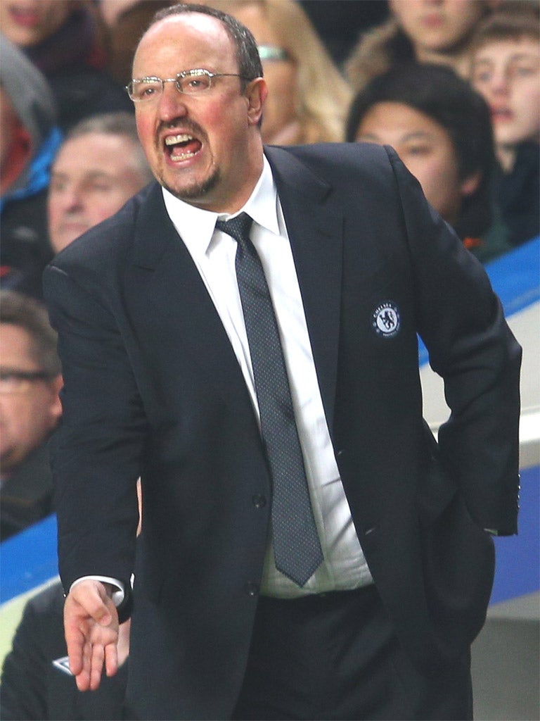Rafael Benitez gives instructions during the Capital One Cup Semi-Final first leg match between Chelsea and Swansea City