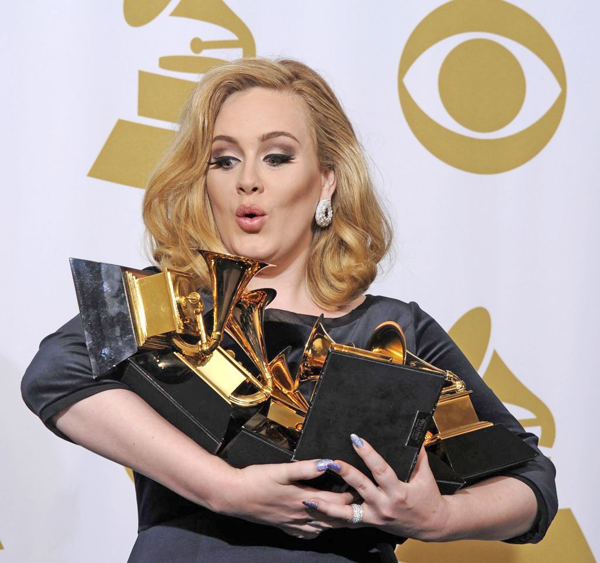 Eyes on the prize: Adele with her Grammys