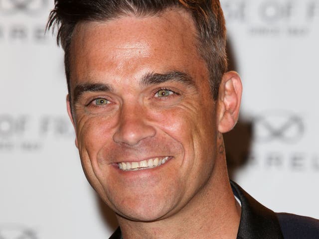 Robbie Williams has said he's 'gutted' Radio 1 won't play his singles
