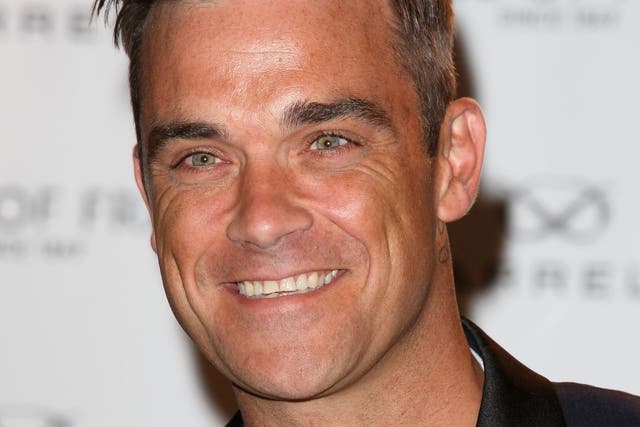 Robbie Williams has said he's 'gutted' Radio 1 won't play his singles