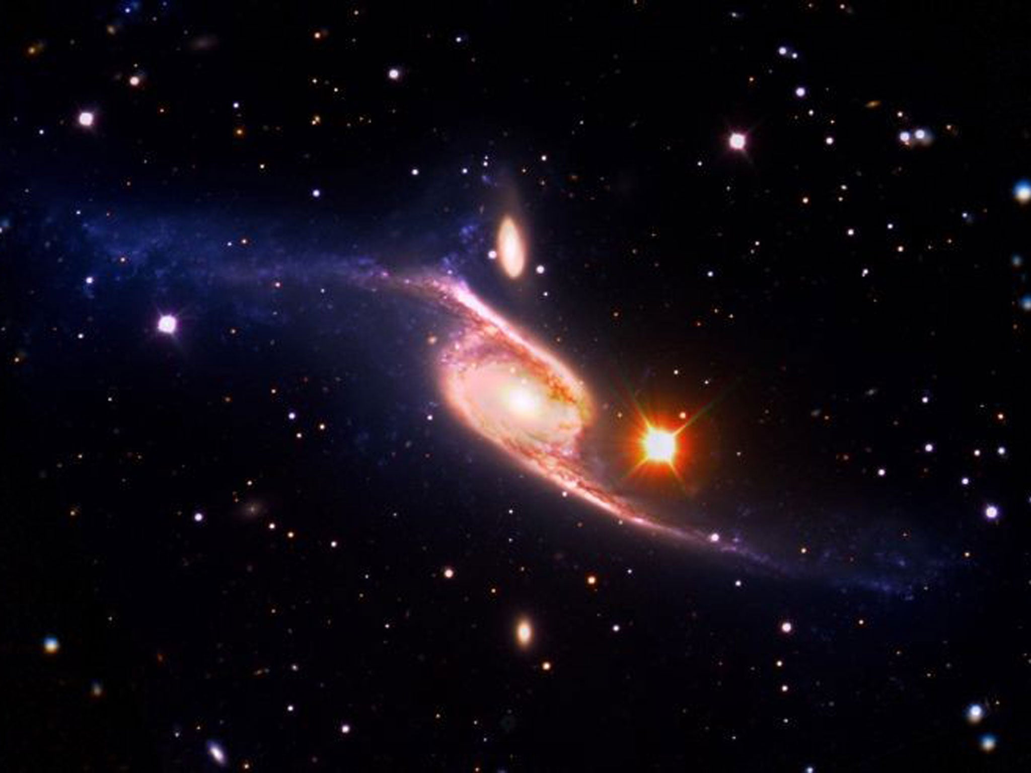 The barred spiral galaxy NGC 6872 is pictured in this undated NASA handout photo