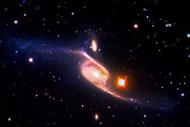 The barred spiral galaxy NGC 6872 is pictured in this undated NASA handout photo 