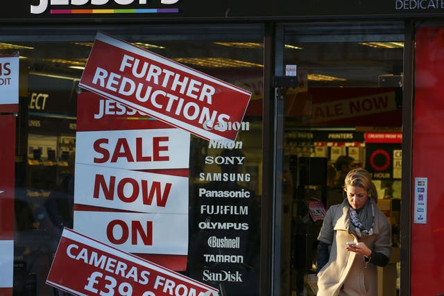A woman leaves a branch of Jessops camera shop in Central London on January 9, 2013. British photographic chain Jessops went into adminstration on January 9, 2013, putting some 2,000 jobs at risk.