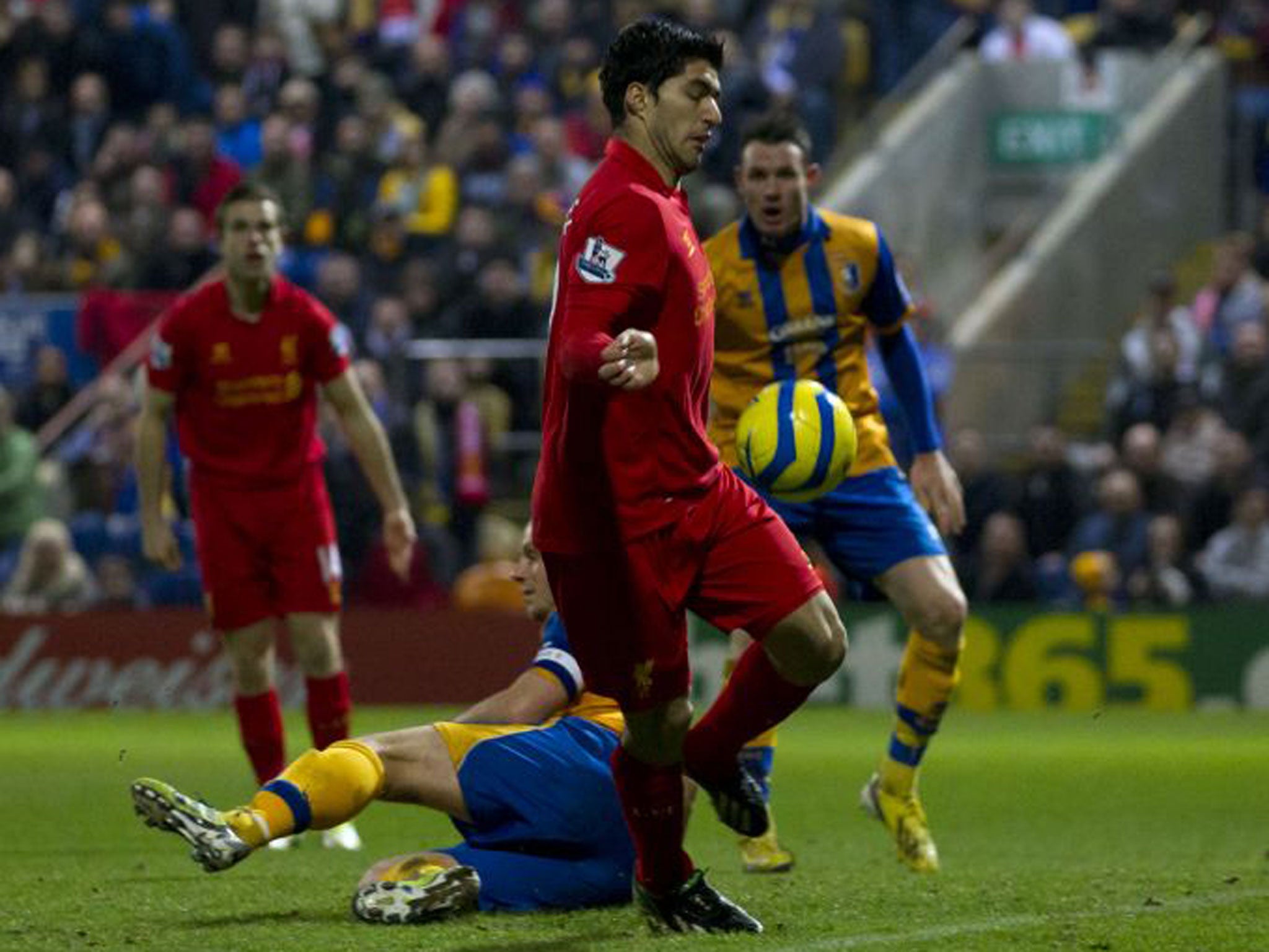 Luis Suarez’s controversial handball against Mansfield