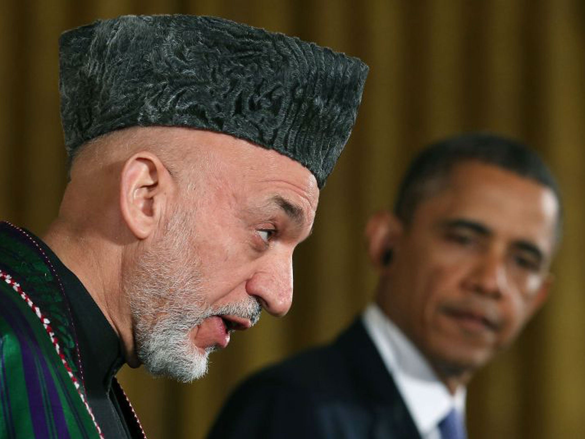 Hamid Karzai and Barack Obama the White House yesterday