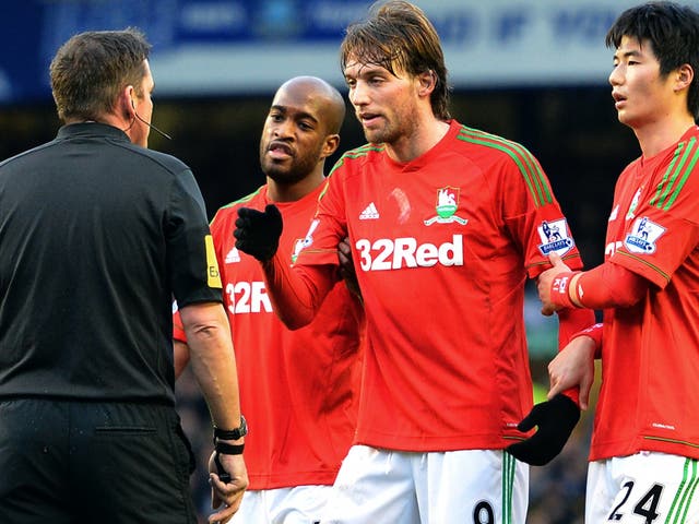 Michu (centre) had a comparatively quiet game
