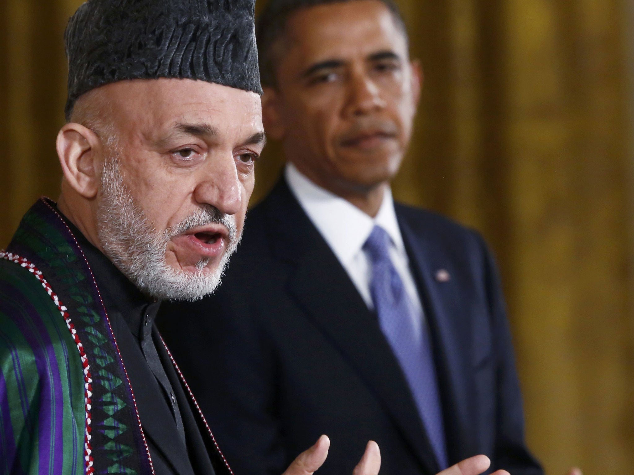 United front: President Hamid Karzai, left ,and President Obama met last week
