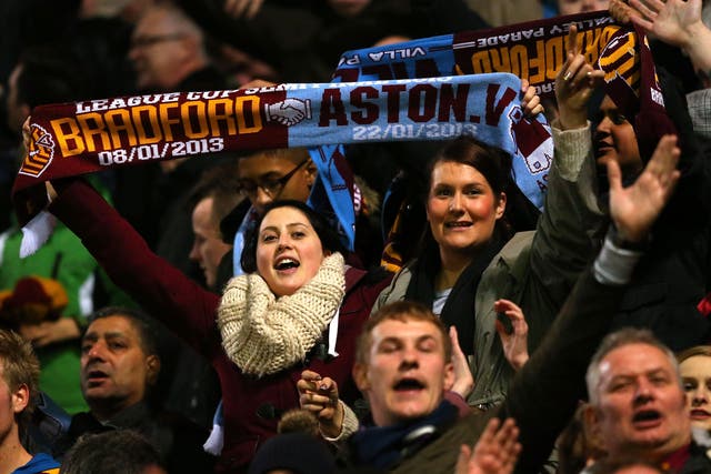 Two into one can go: Fans of Premier League clubs will find plenty to enjoy in following a lower-League team as well 