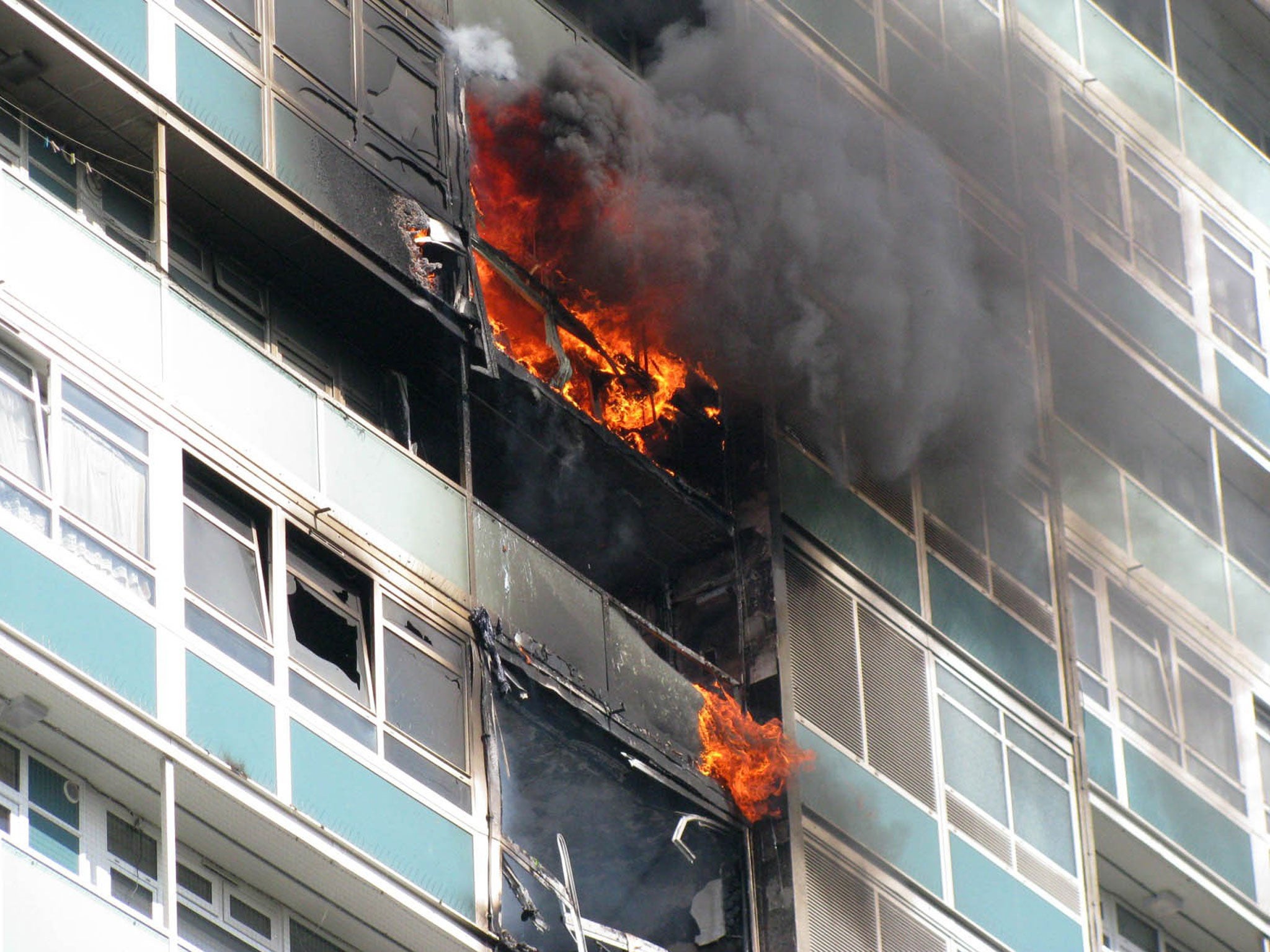 Tragedy: Lakanal House in the Sceaux Gardens estate in Camberwell, south London, which caught fire in July 2009, killing six people