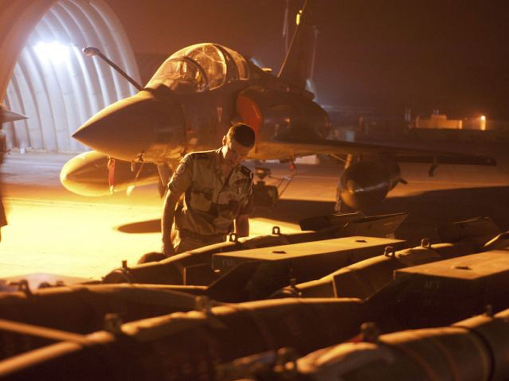 A French Mirage 2000D fighter plane is prepared for action in N’Djamena, Chad