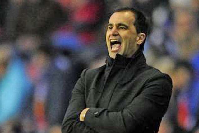 Wigan manager Roberto Martinez is resisting the urge to bring in a centre-back this month