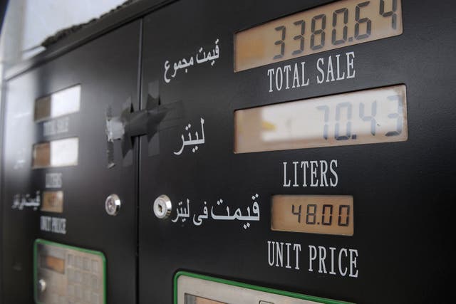 An automated pumping machine displays the rates of different types of gasoline at station in Shamali Plains, some 20 kms north of Kabul