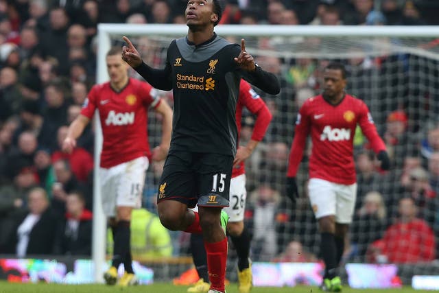 Daniel Sturridge celebrates his first Liverpool league goal