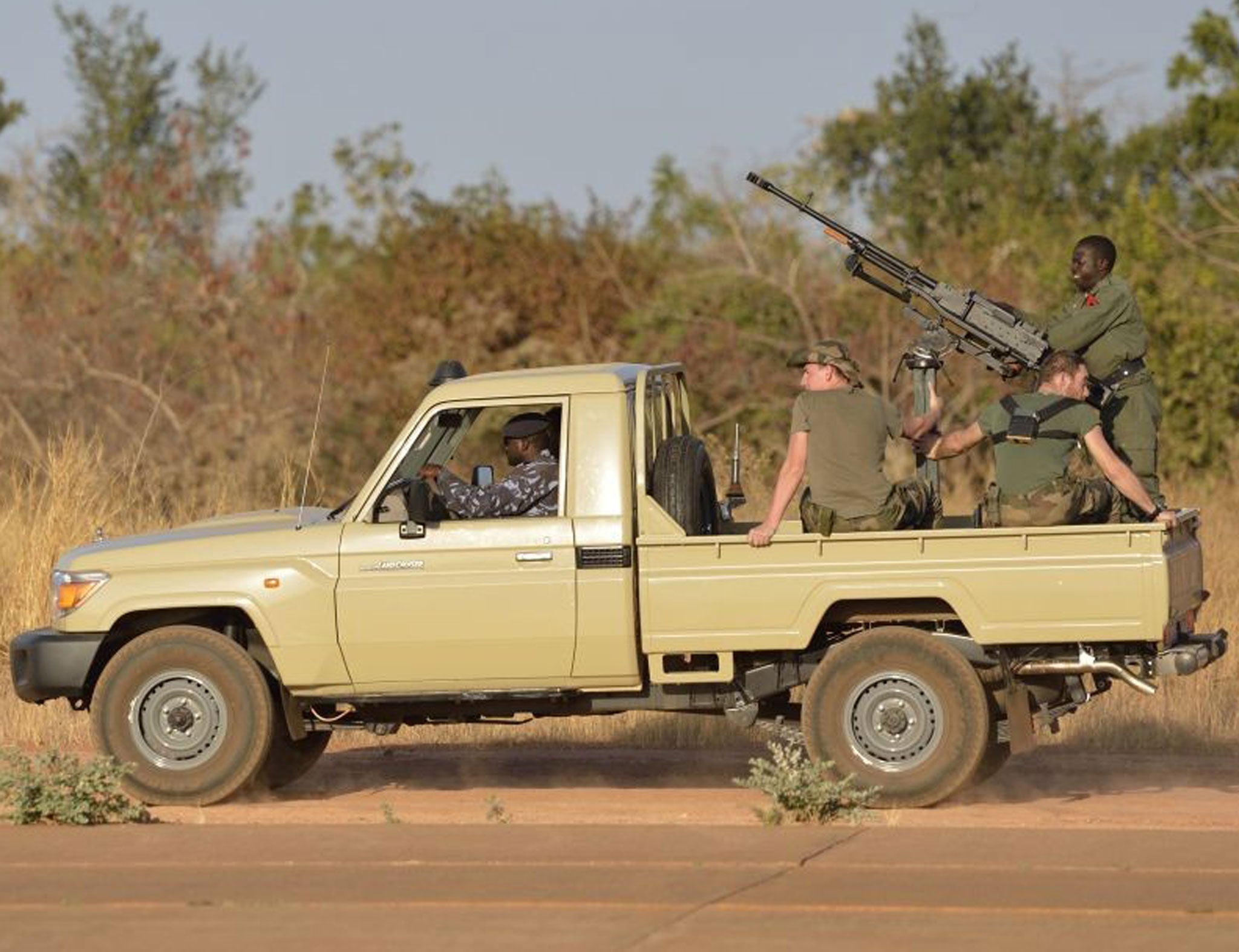 French soldiers aboard a Malian military car at a military airbase near Bamako 