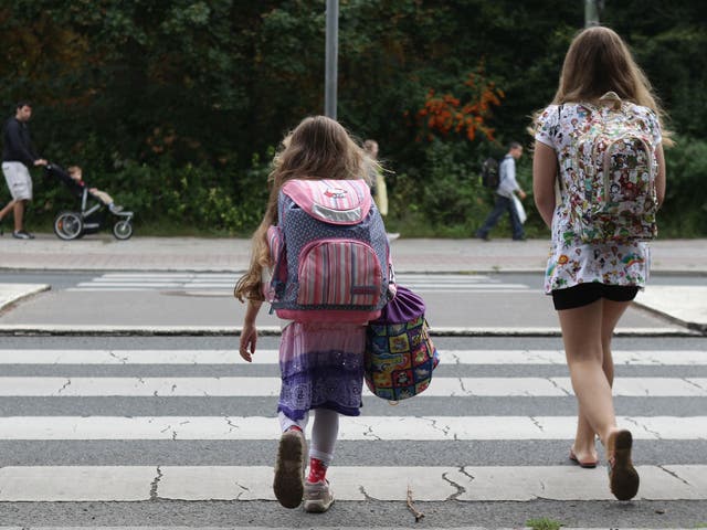 Children walk down the way on the first school day on August 23, 2010 in Berlin, Germany.