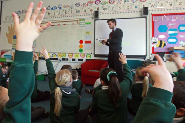 School pupils at the Bridge Learning Campus answer questions in a classroom at the school on February 24, 2010 in Bristol, England.