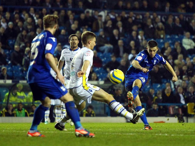 Birmingham City's Callum Reilly curls a shot at goal against Leeds