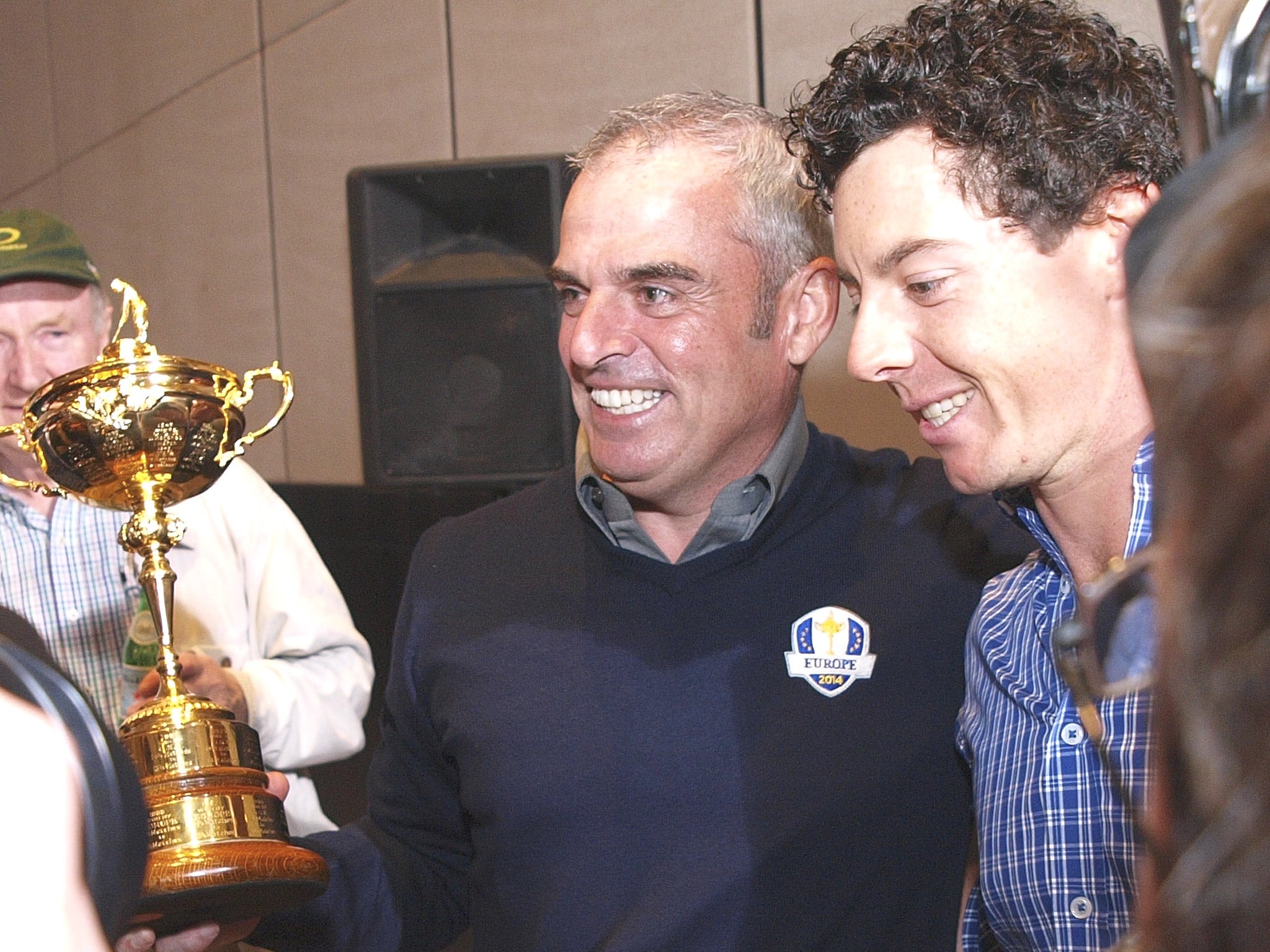 Paul McGinley (centre) and Rory McIlroy in Abu Dhabi yesterday