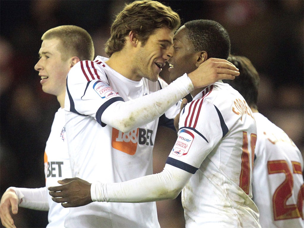 Marvin Sordell (right) celebrates one of his two goals for Bolton