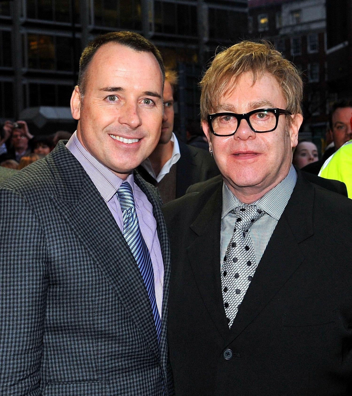 Sir Elton John and partner David Furnish. Sir Elton John says his family is now complete after he became a parent for the second time.