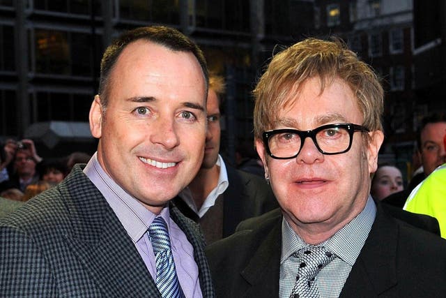 Sir Elton John and partner David Furnish. Sir Elton John says his family is now complete after he became a parent for the second time. 